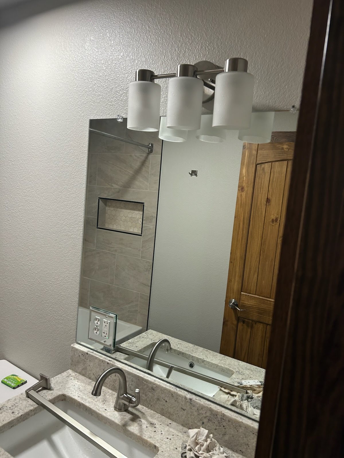 Custom bathroom vanity mirror installation in Sherman, TX